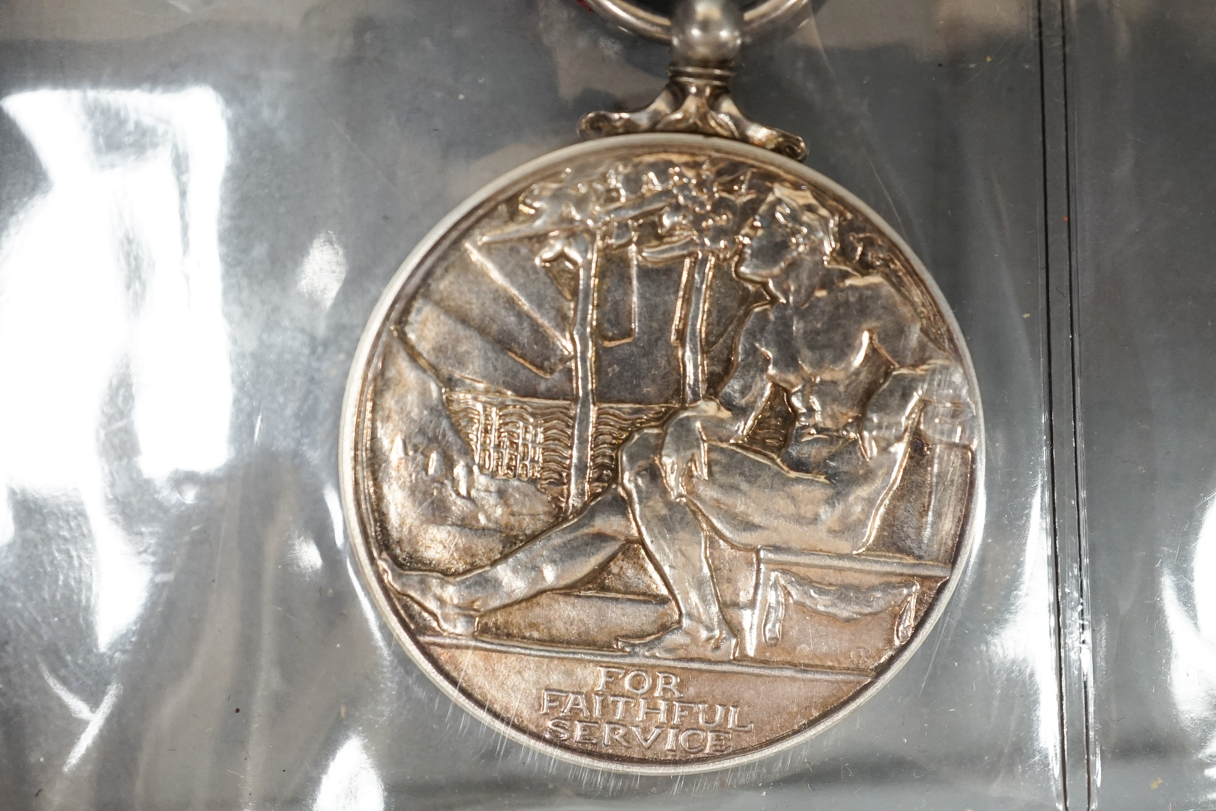 Three Imperial Service medals to Edward James Parker, William Horsfield and Albert Edward Ellis and two Service medals of the Order of St John to 13472 A/SIS.M.TIDMAN.BRISTOL.NO.1.NSG.DIV.NO.2DIS.JAB. 1935 and E692 SGT.